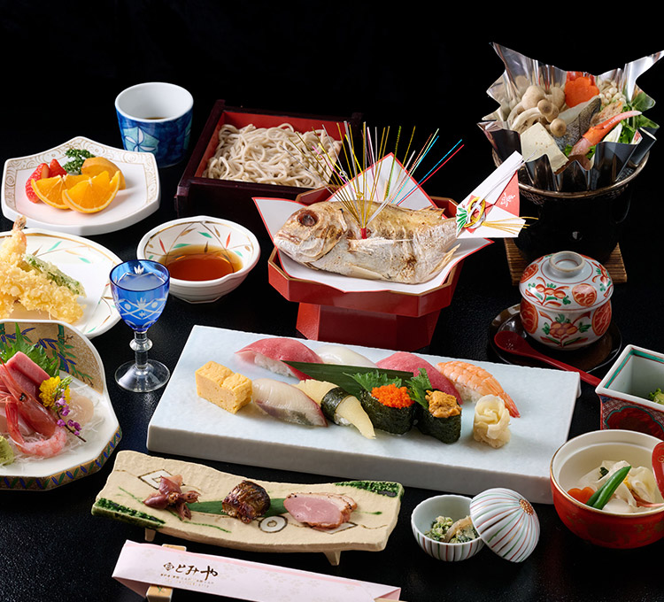写真：お祝いの席を華やかに演出する、祝い鯛の姿焼きが付いた豪華な会席コースが人気